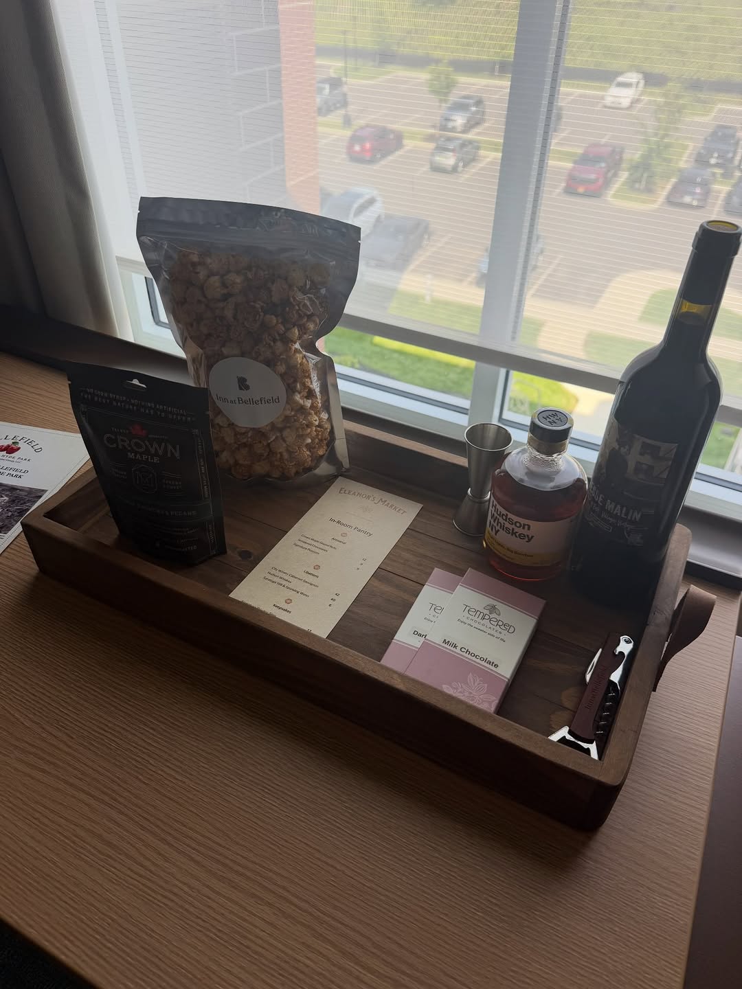 Welcome tray at the Inn at Bellefield with Crown Maple snacks and Hudson Whiskey